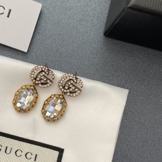 p45 Gucci Earrings [Purchase Level] Gucci Gucci Earrings Original Logo Print